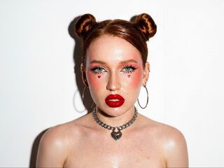 cam girl playing with vibrator BellaMesmer